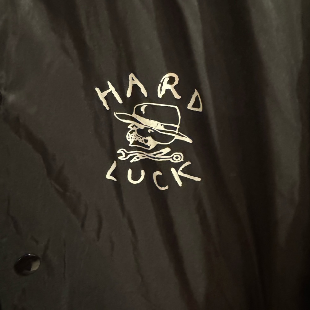 Large Hard Luck Skate black windbreaker